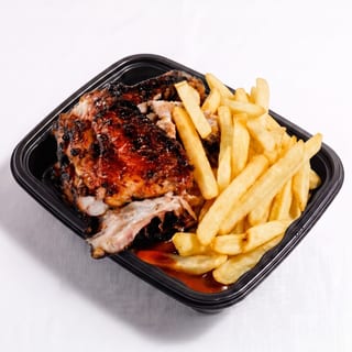 Jerk Chicken with Fries or Festival Bread